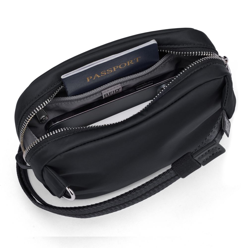 Сумка через плече антизлодій Pacsafe W Micro sling